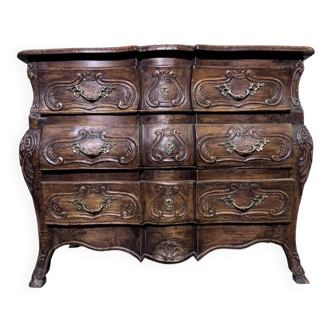 Curved tomb chest in the Provençal Louis XV style made of solid wood.