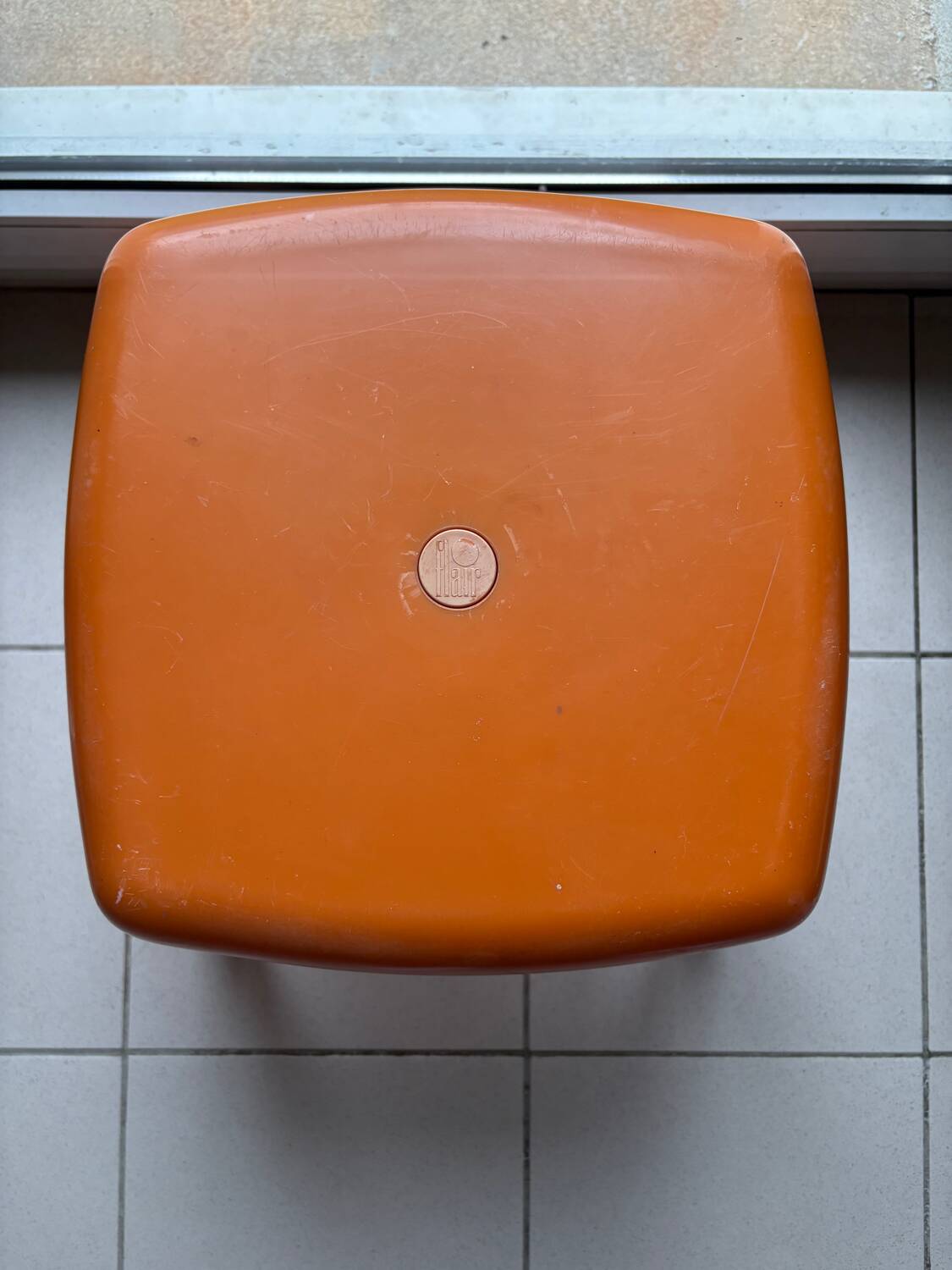 Vintage orange Flair stool from the 70s