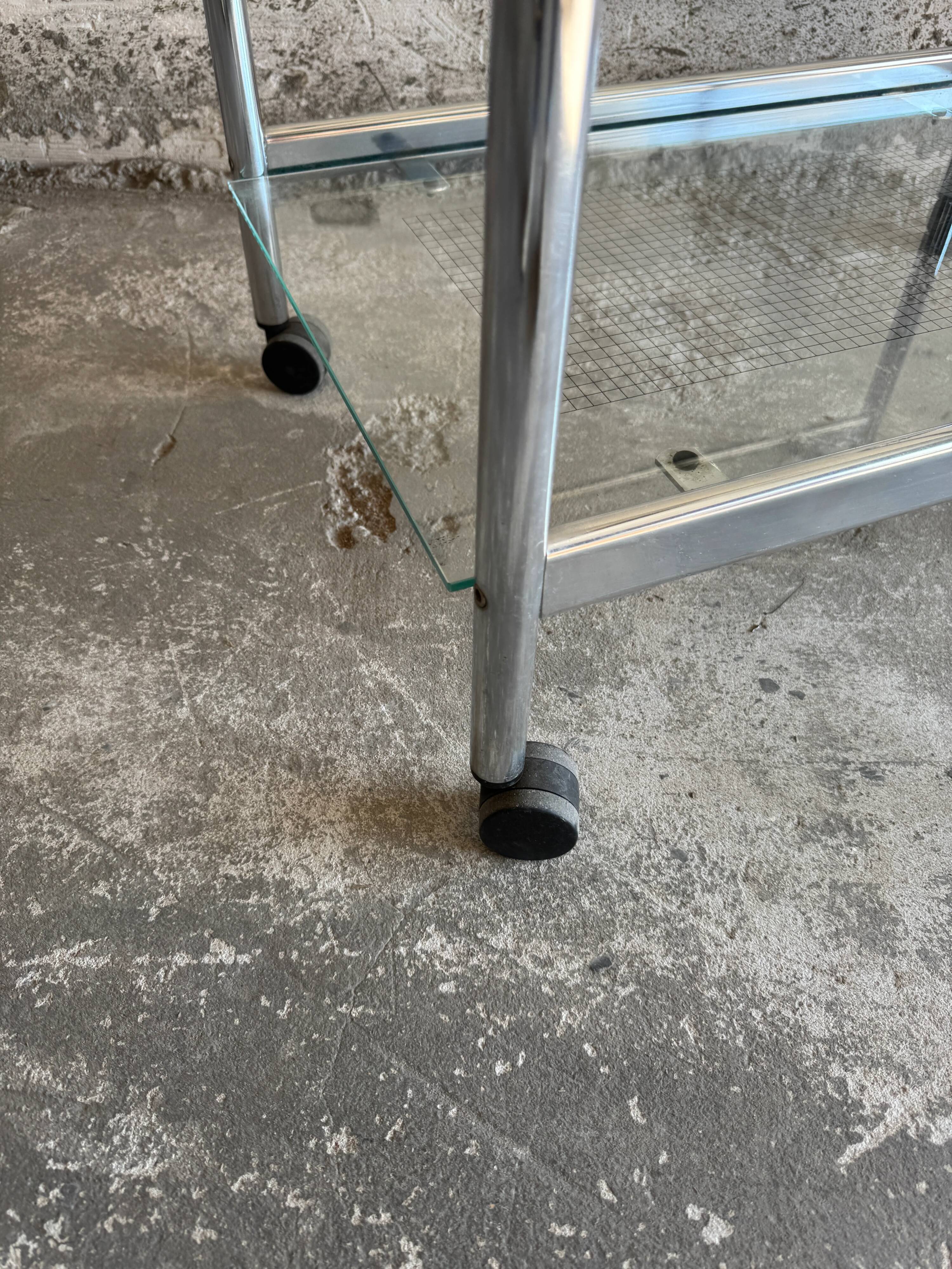 Vintage silver chrome-plated steel and glass two-tier serving trolley with wheels