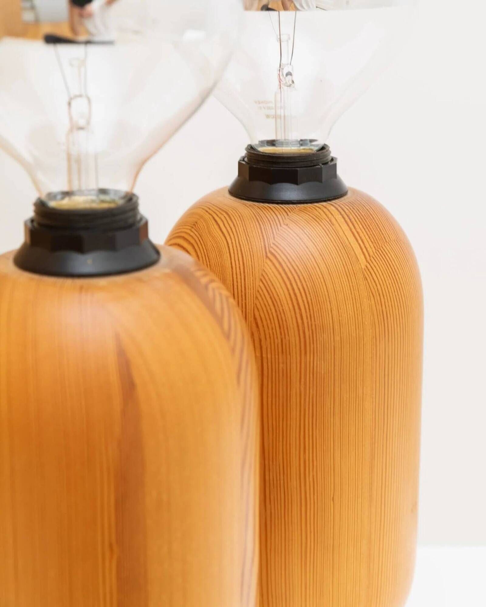 Pair of XXL Domus table lamps in marron wood with chrome globe bulbs