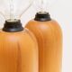 Pair of XXL Domus table lamps in marron wood with chrome globe bulbs