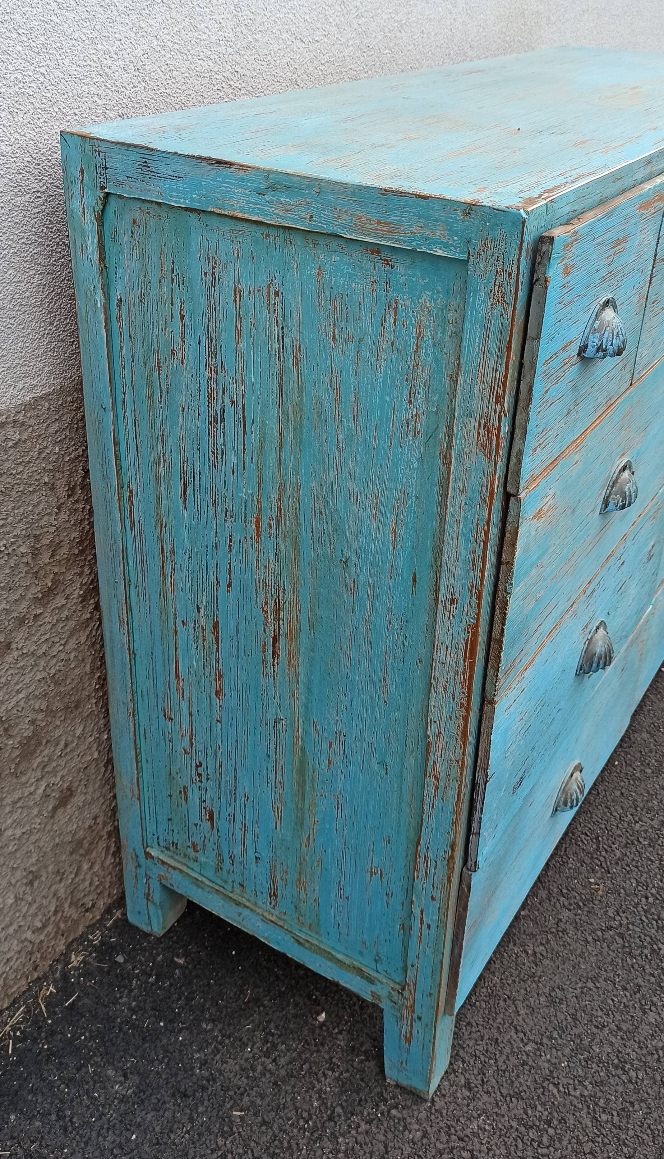 Blue wooden dresser with drawers
