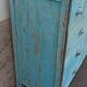 Blue wooden dresser with drawers