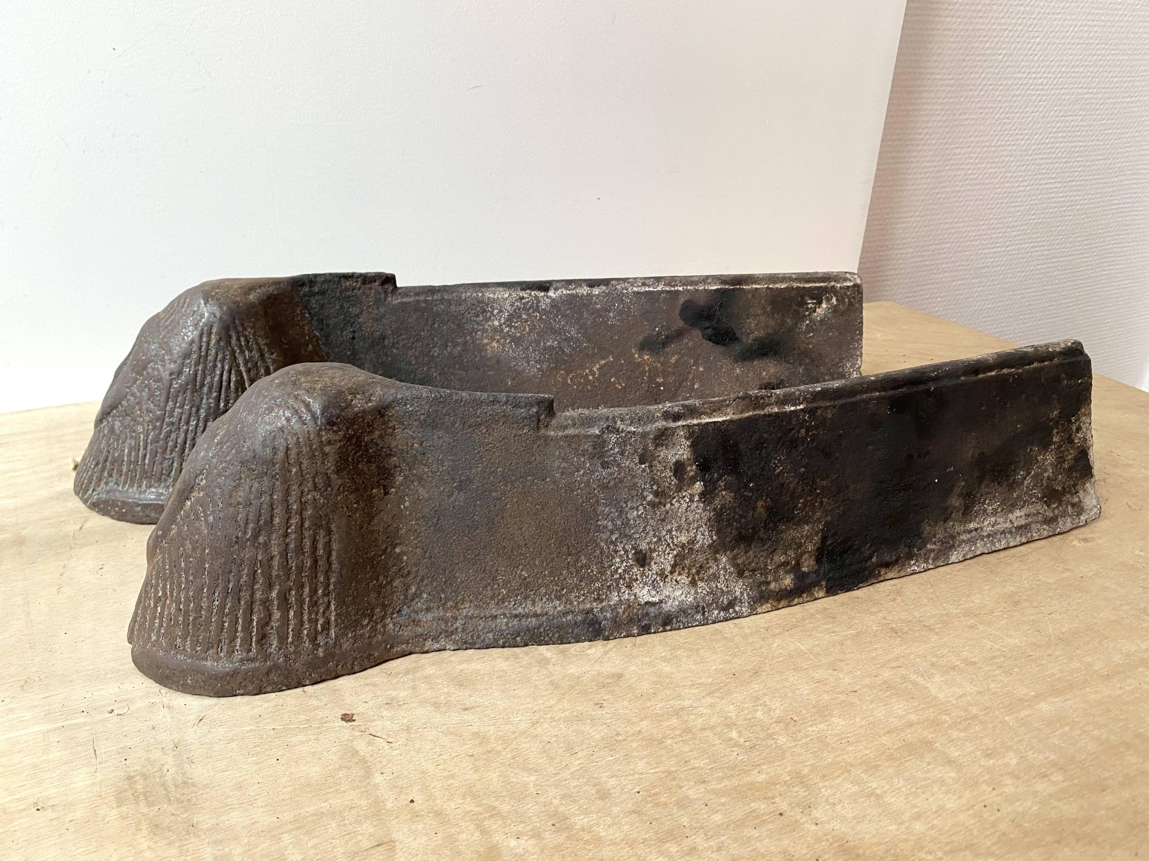 Pair of modernist anthropomorphic fireplace andirons, brutalist log holders 1950s