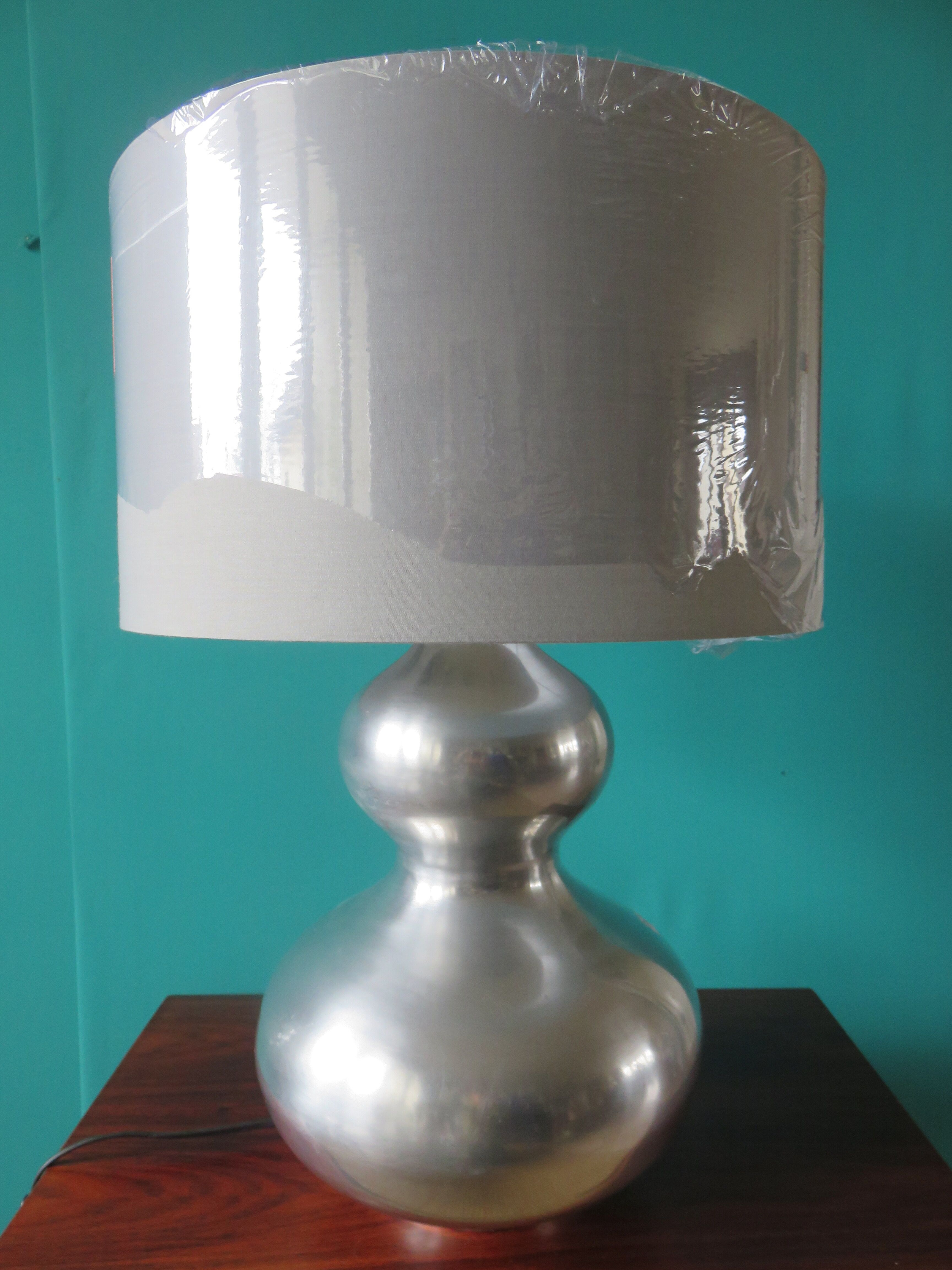 Lampe en acier brossé. France 1970