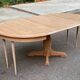 Large extendable round dining table stripped with a central wooden leg 110-198cm.