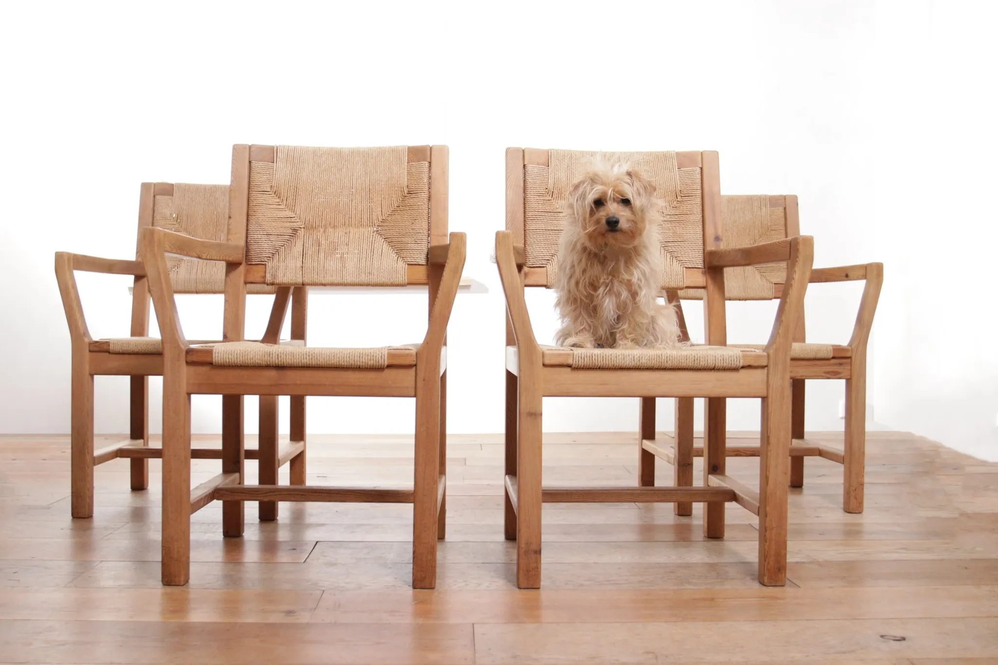 Set of four mid-century modern Danish dining chairs papercord solid pine
