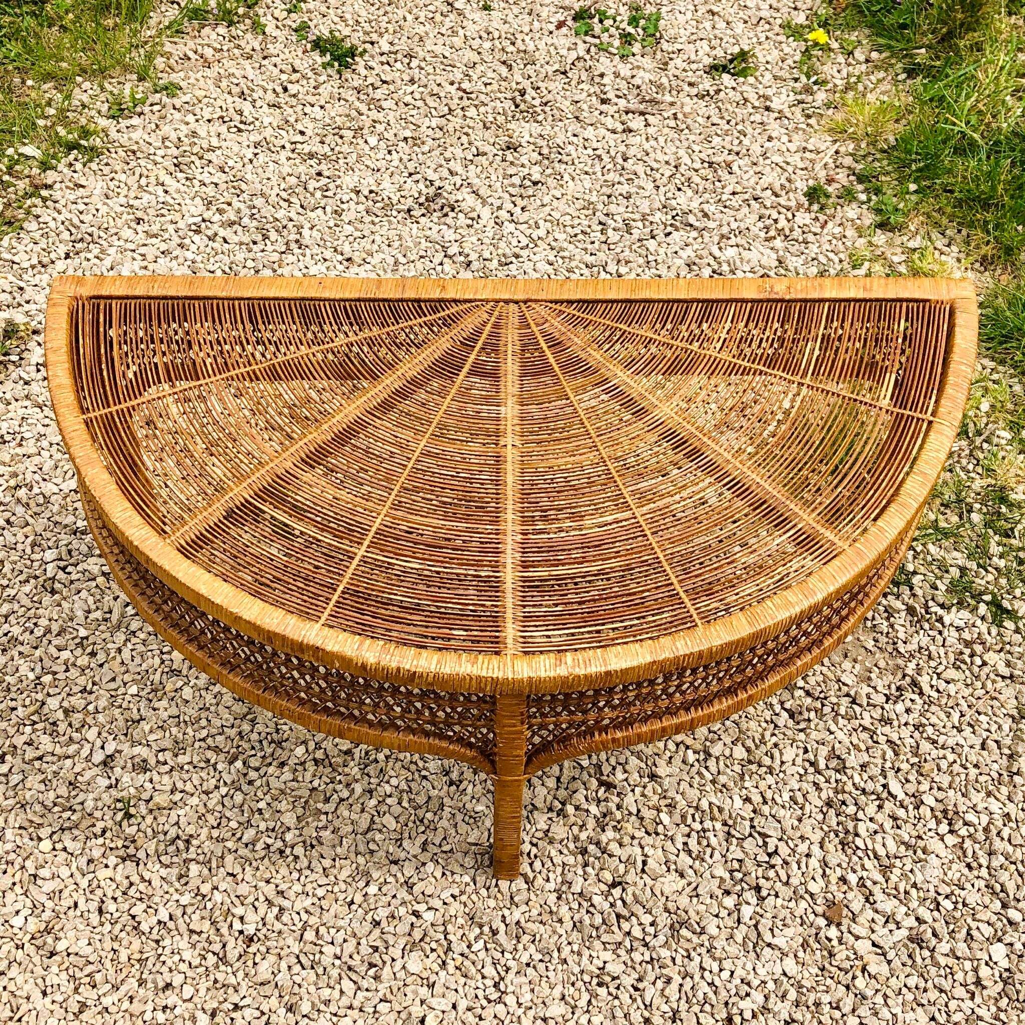 Half-moon rattan coffee table