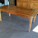 Teak table with extension cords