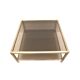 Large vintage Hollywood Regency coffee table made of brass and smoked glass from the 1970s