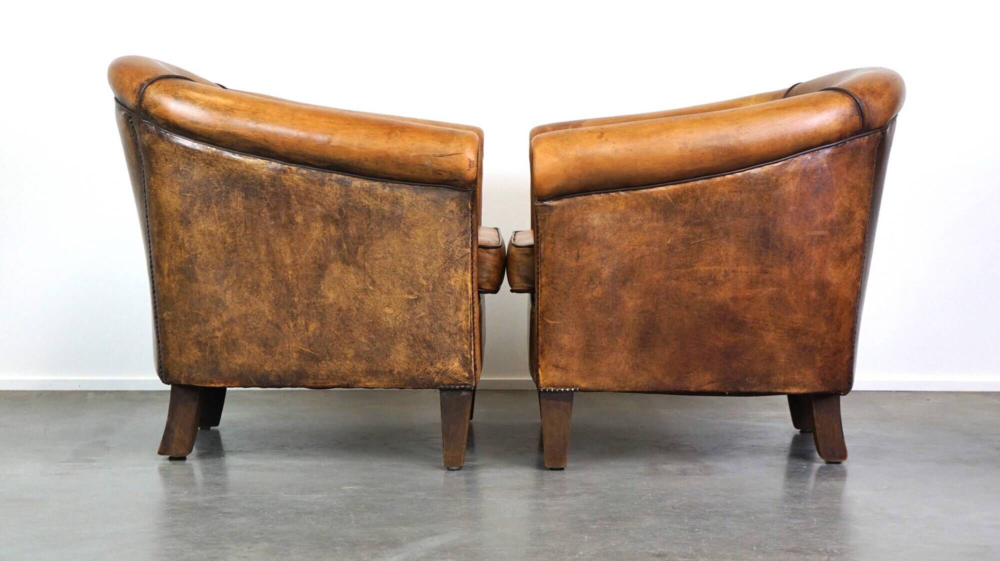 Set of 2 stylish yet beautiful and comfortable sheepskin club armchairs