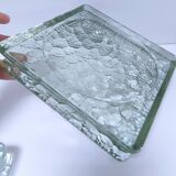 Two designer glass paving pockets