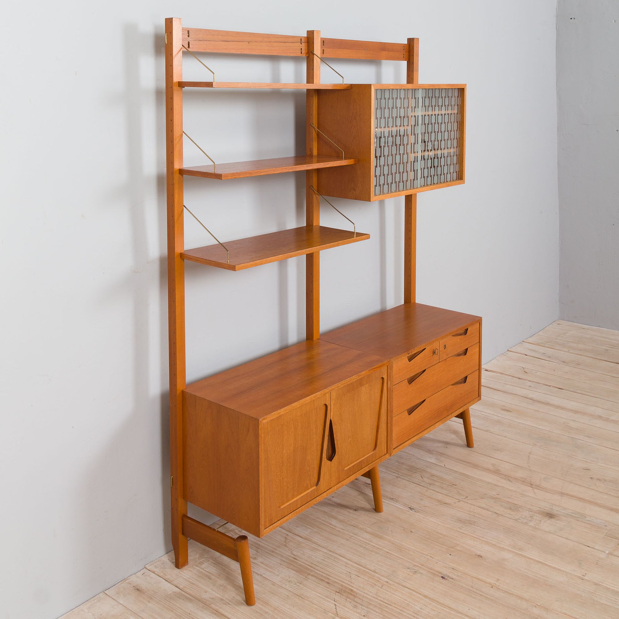 Rival 2 bay free standing teak wall unit with 3 cabinets and 3 shelves by Brodrene Jatogs Norway, Kj
