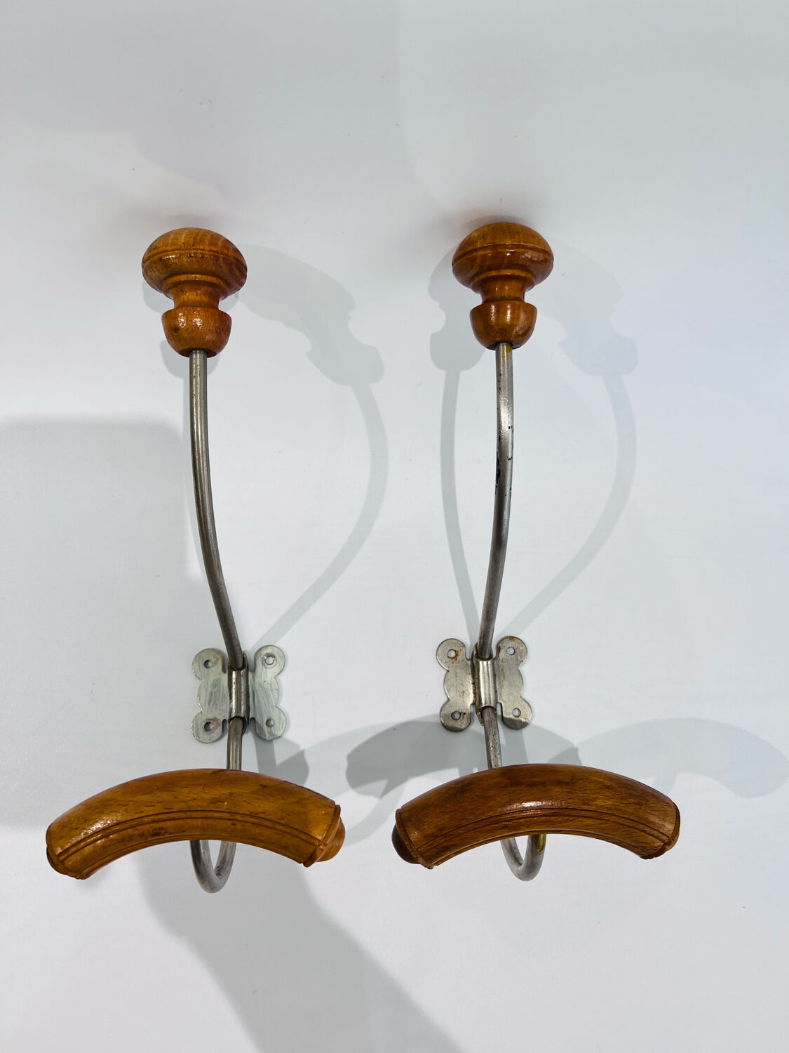 Pair of vintage hooks wood and metal