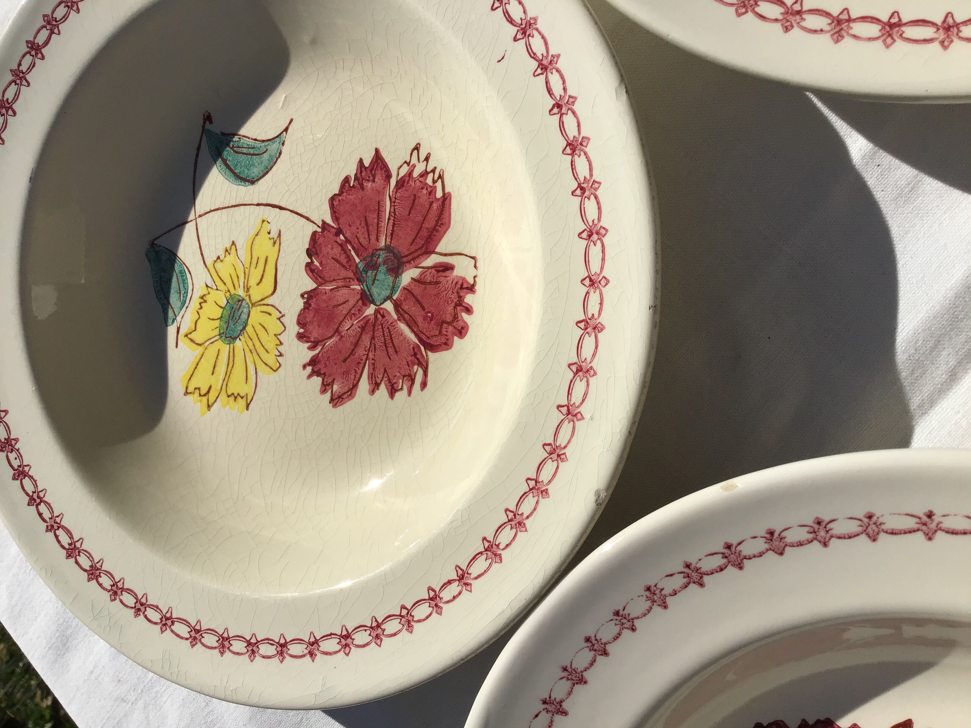 8 hollow plates burgundy and yellow flowers