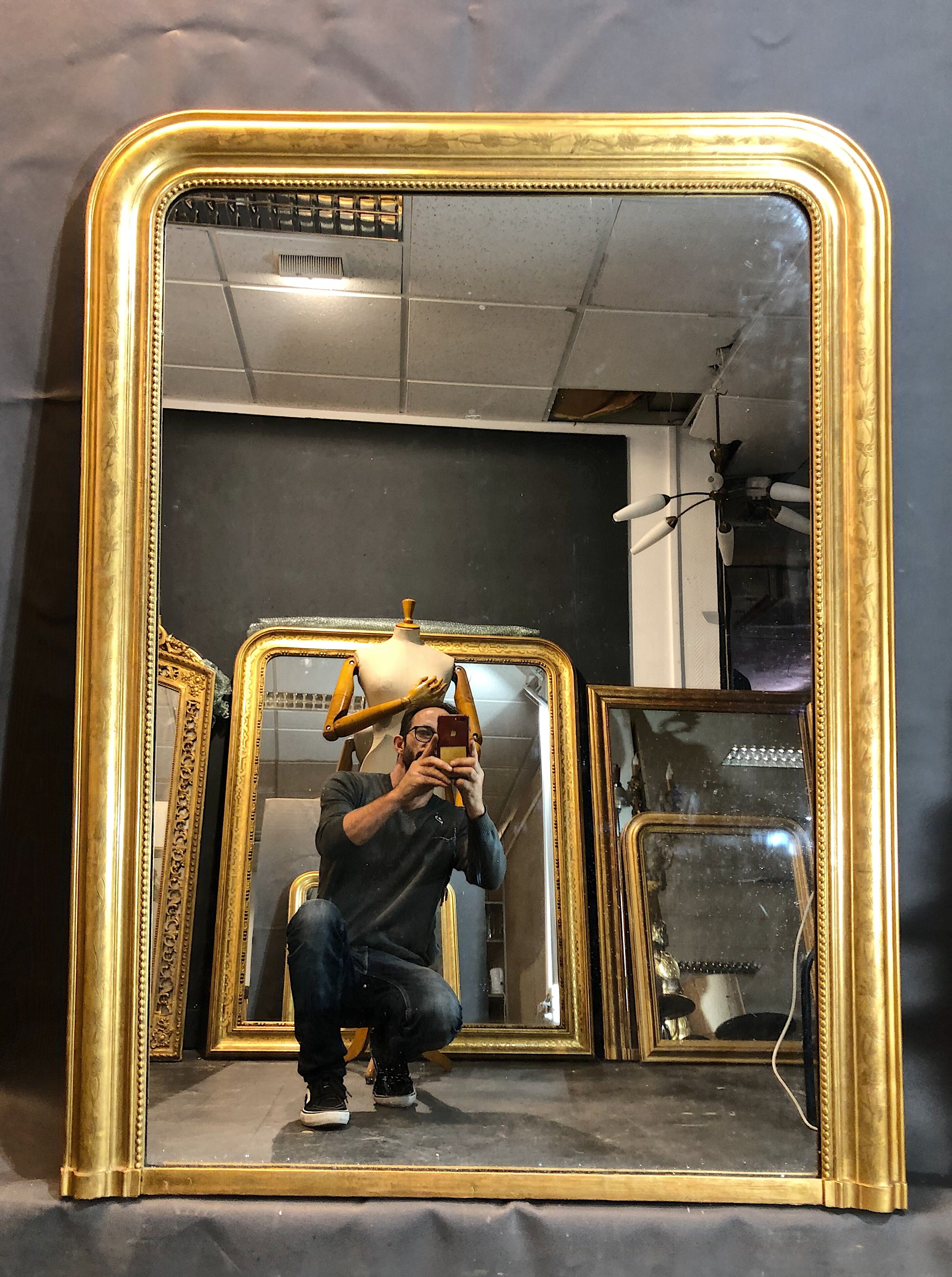 Old mirror 133x100cm gilded with gold leaf