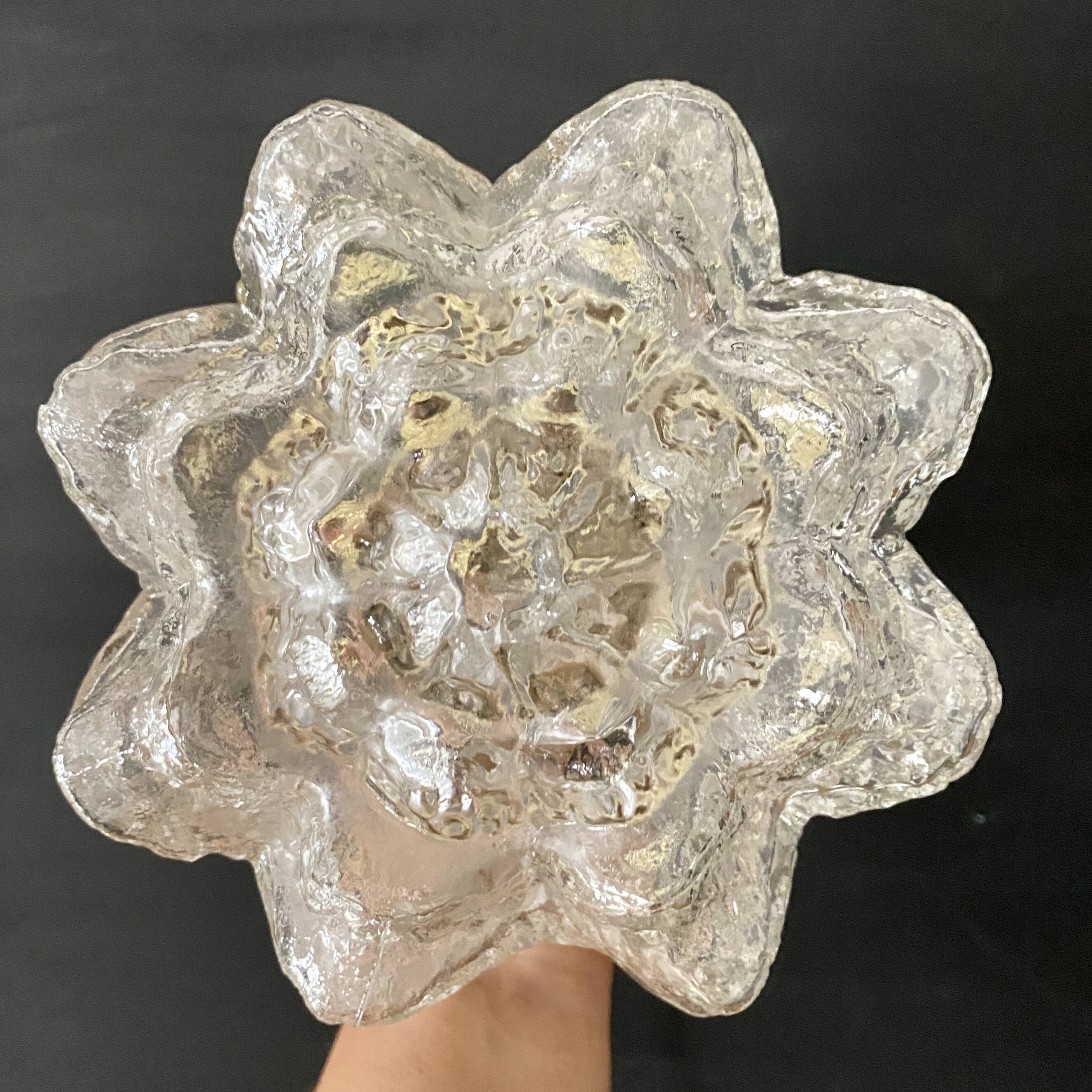Vintage globe wall or ceiling light in molded glass in the shape of a flower