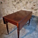 Antique English drop-leaf table in mahogany, late 19th century.