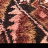 Small handmade Persian rug