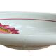 Large antique salad bowl on a pedestal, made of Sarreguemines earthenware.