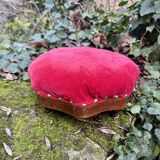 Red velvet footstool in the Louis XV style
