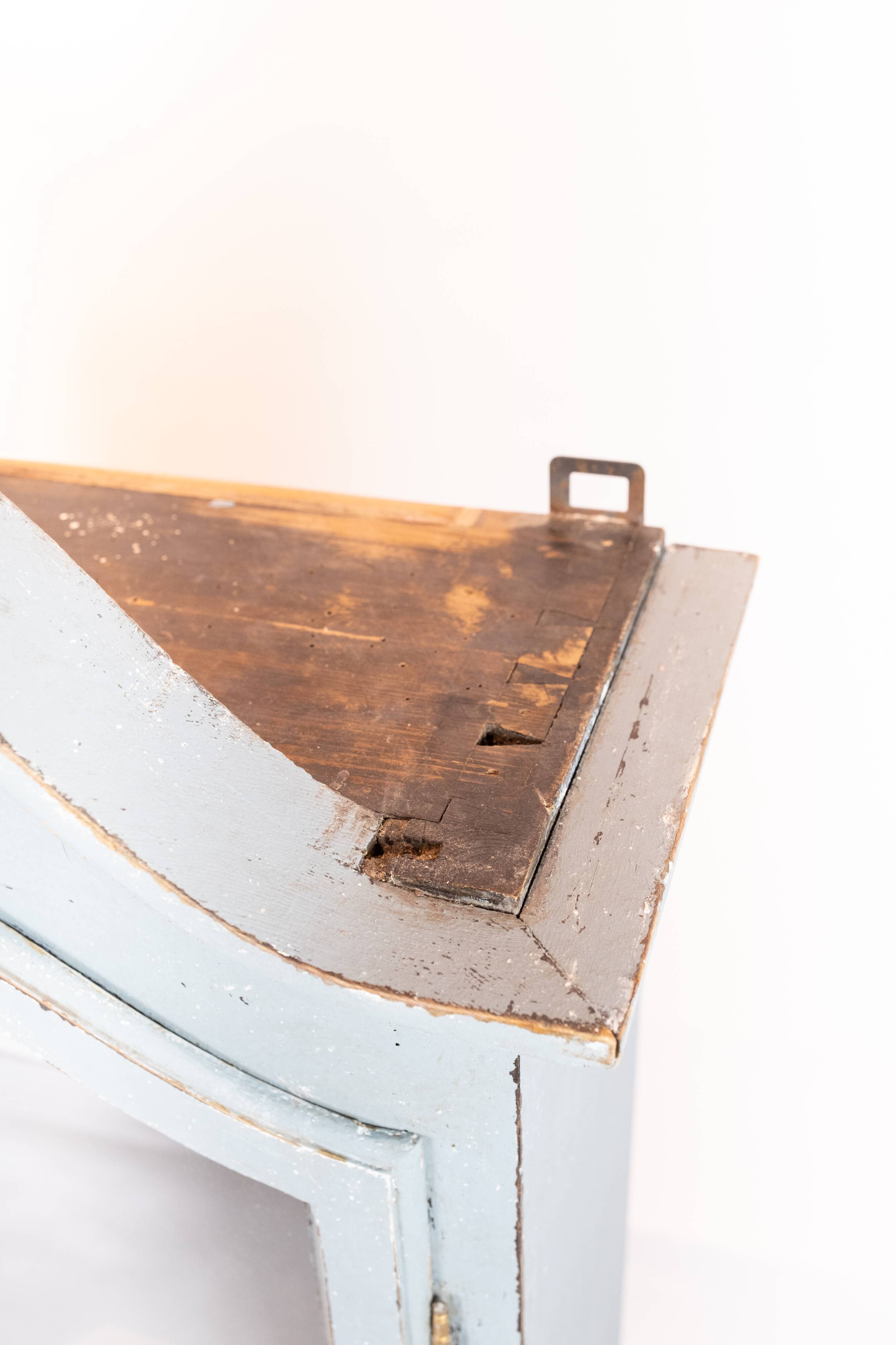 Grey painted hanging glass cabinet in gustavian style from around 1820.