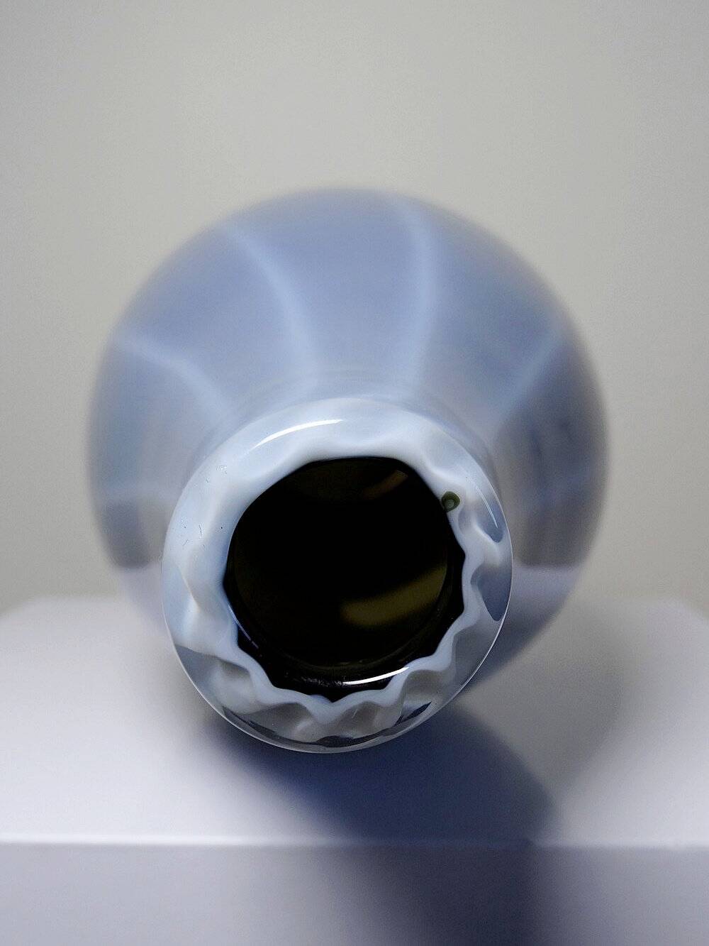 Pair of vintage smoky glass vases lined with opaline, Murano bubble glass.