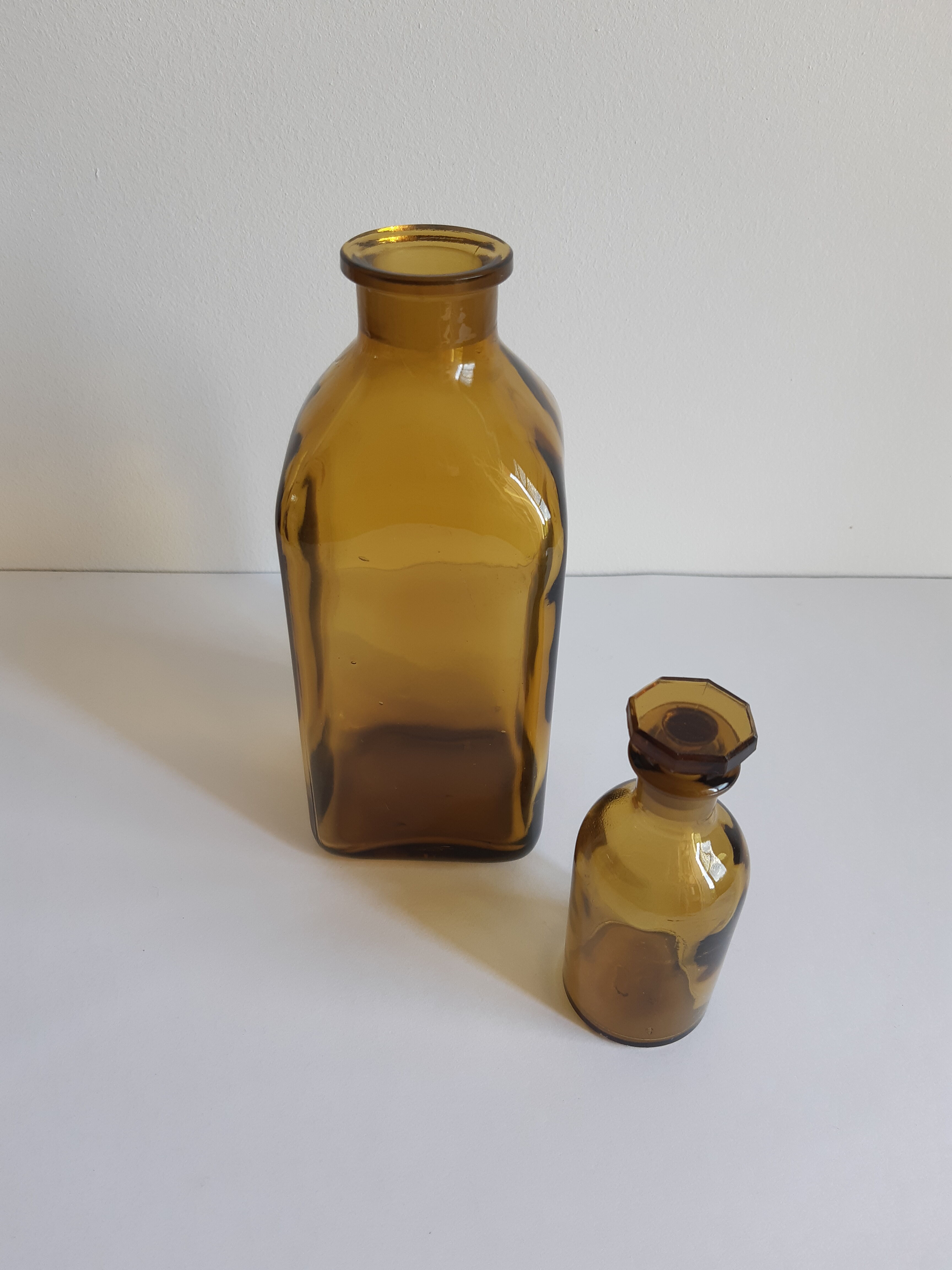 Set of 2 vintage glass bottles