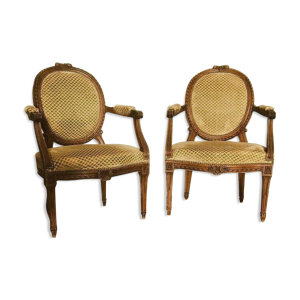 Paire de fauteuils de style louis XVI dossiers médaillons XX siècle
