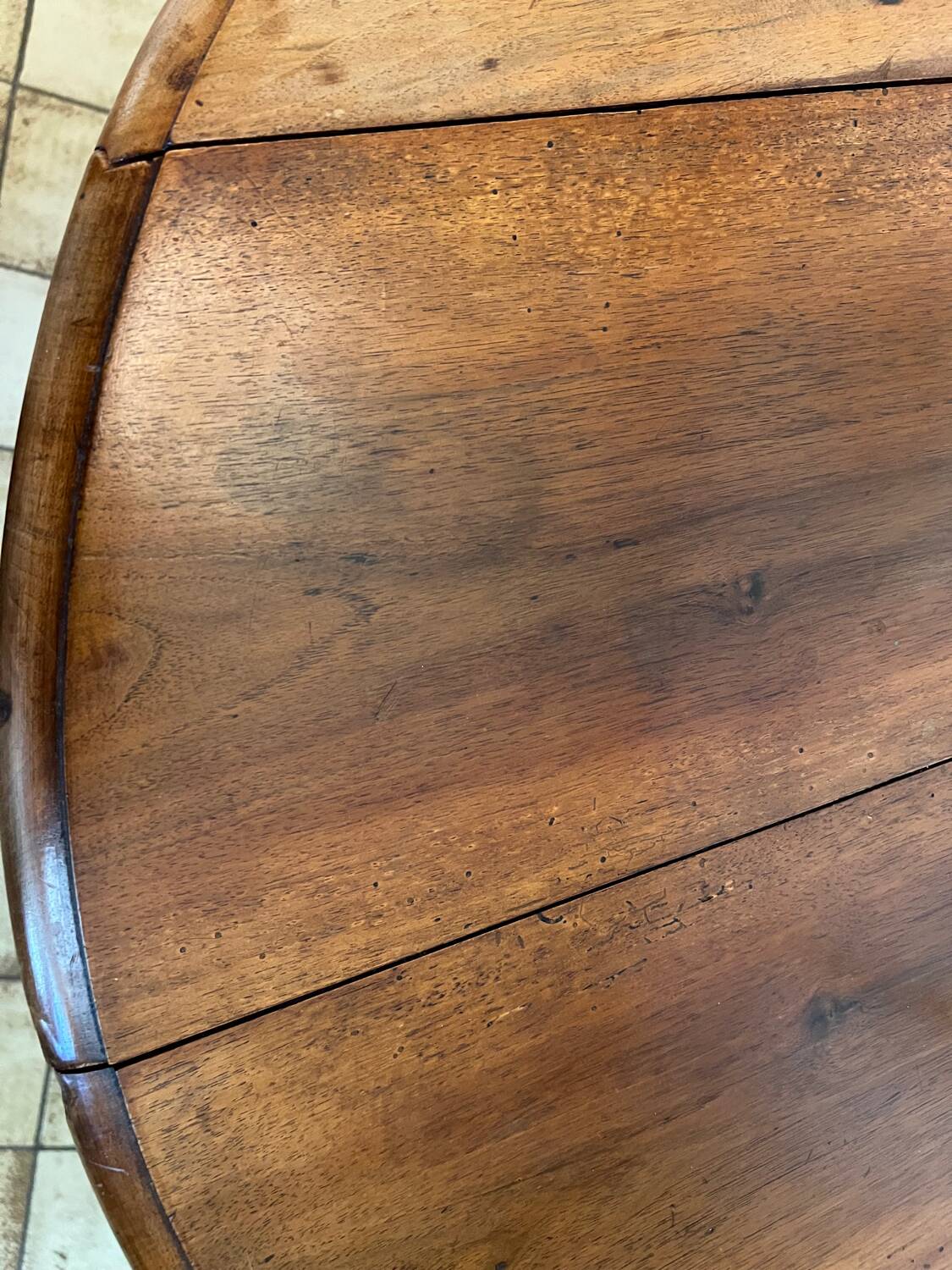 Folding round wooden table