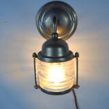 Vintage wallmounted brass lamp from a ship.