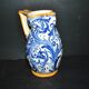 Large Italian ceramic pitcher barbotine majolica blue and yellow decoration