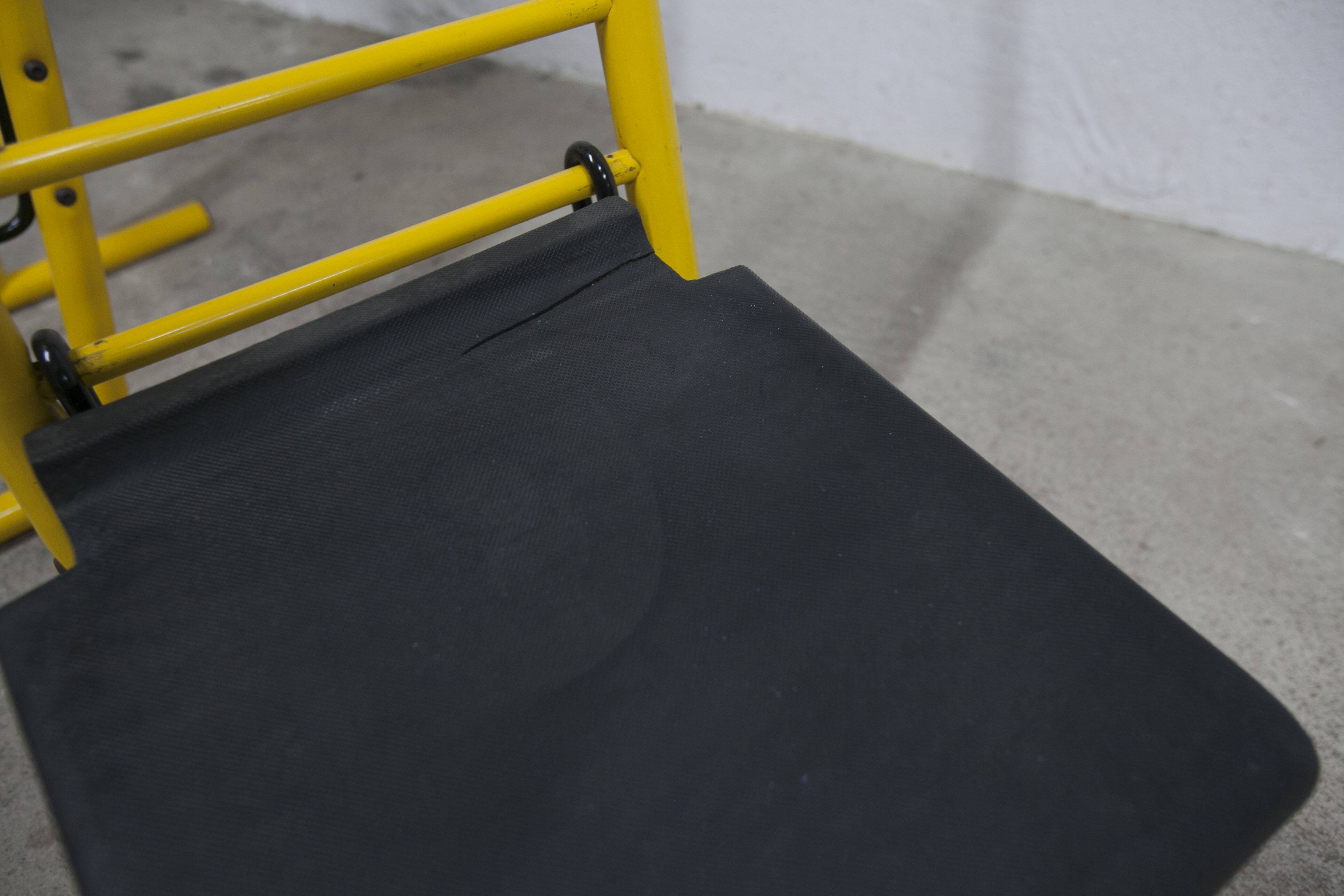 Pair of adjustable Italian bar stools in lacquered yellow and black