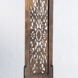 Rectangular Indonesian construction element with blue and yellow plant in carved wood