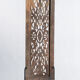 Rectangular Indonesian construction element with blue and yellow plant in carved wood