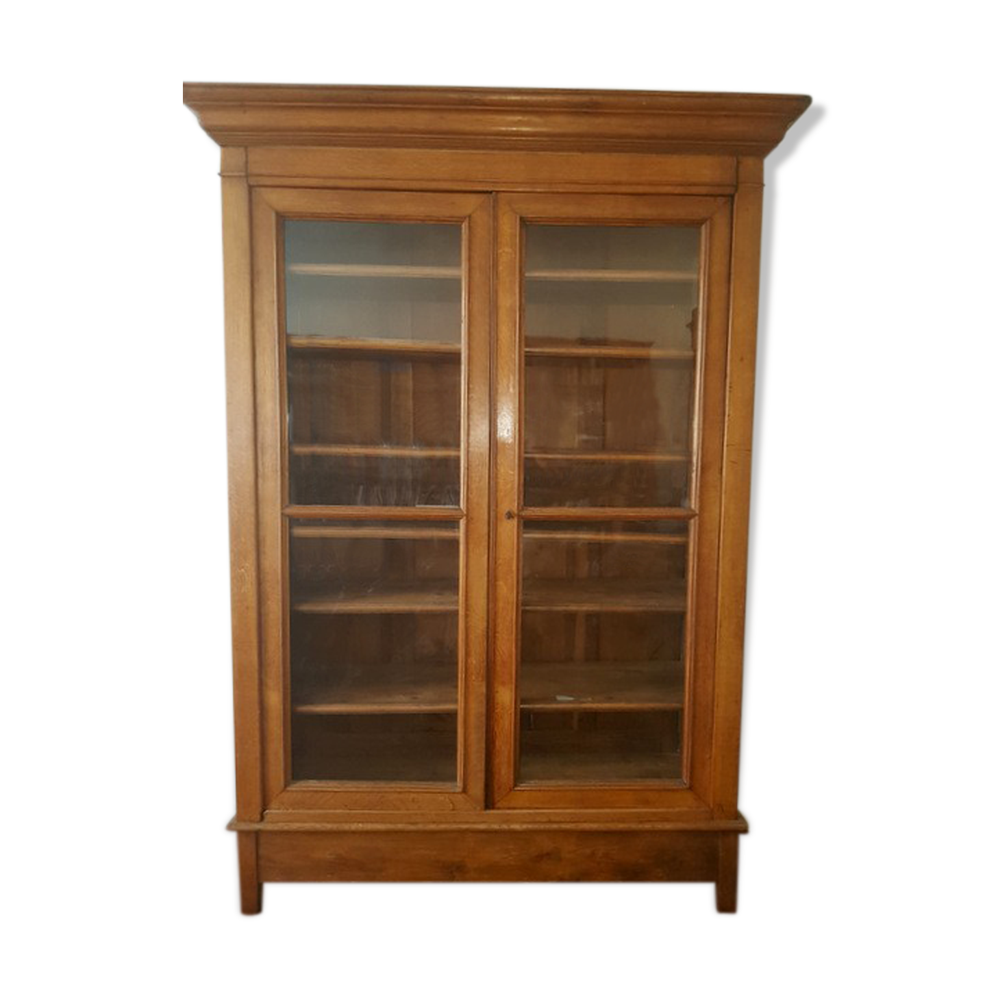 Glazed library in gilded oak