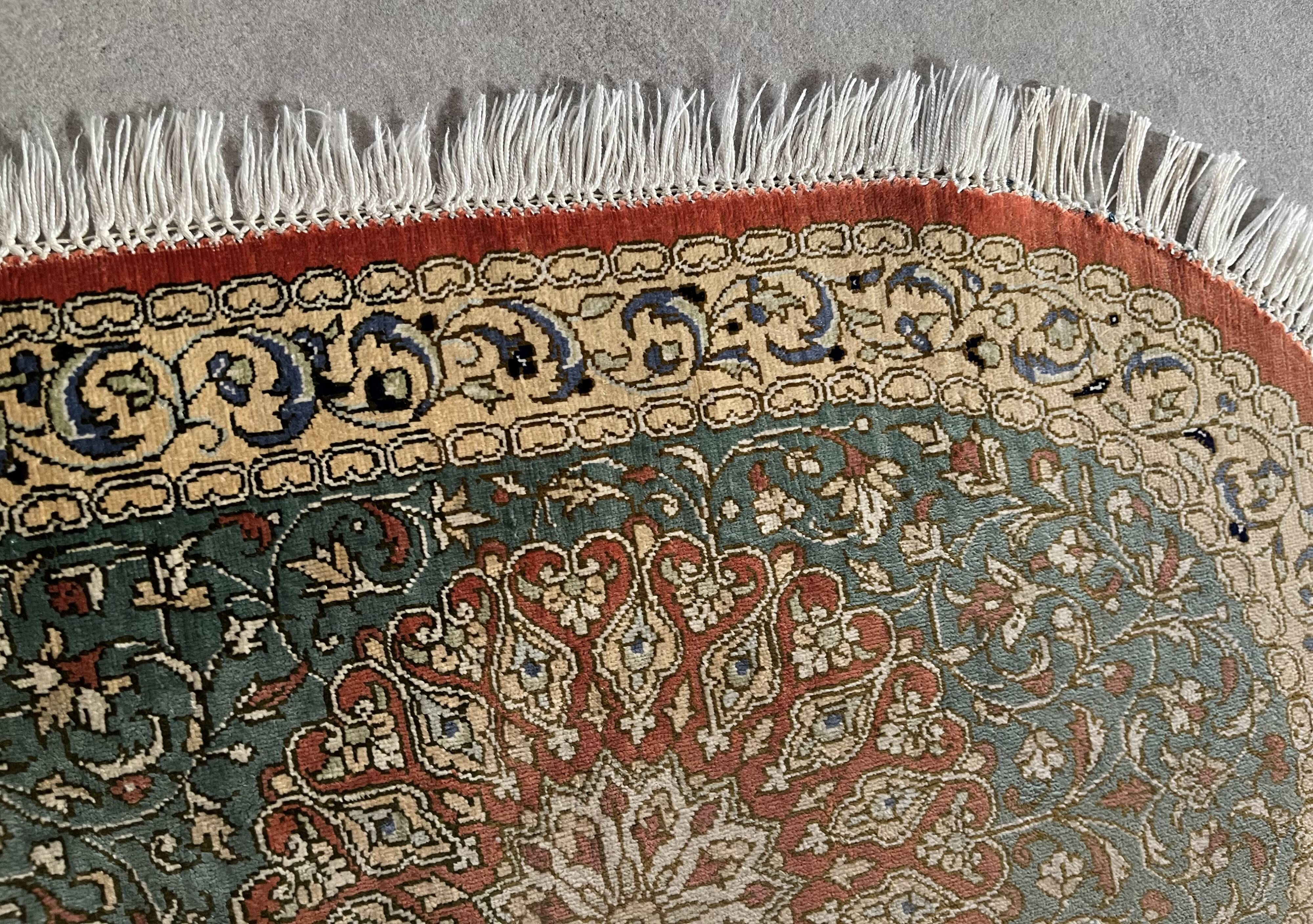 Sino Hereke oval silk rug