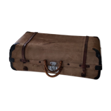 Old suitcase in canvas, wood and metal