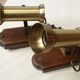 Pair of brass spots and wooden base year 70