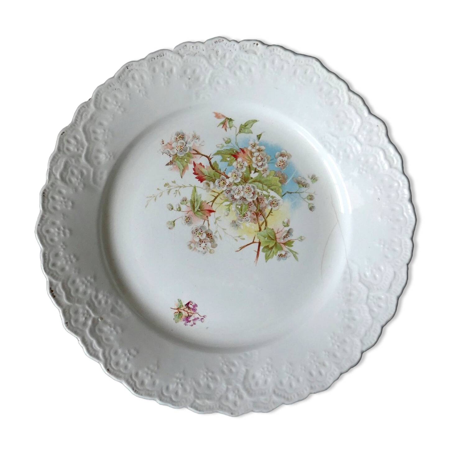 Antique plate with cherry blossom decoration