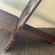 Chaise vintage à palabre en bois sculpté