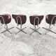 Set of 4 Mid Century Modern swivel chairs in tubular steel and leather.