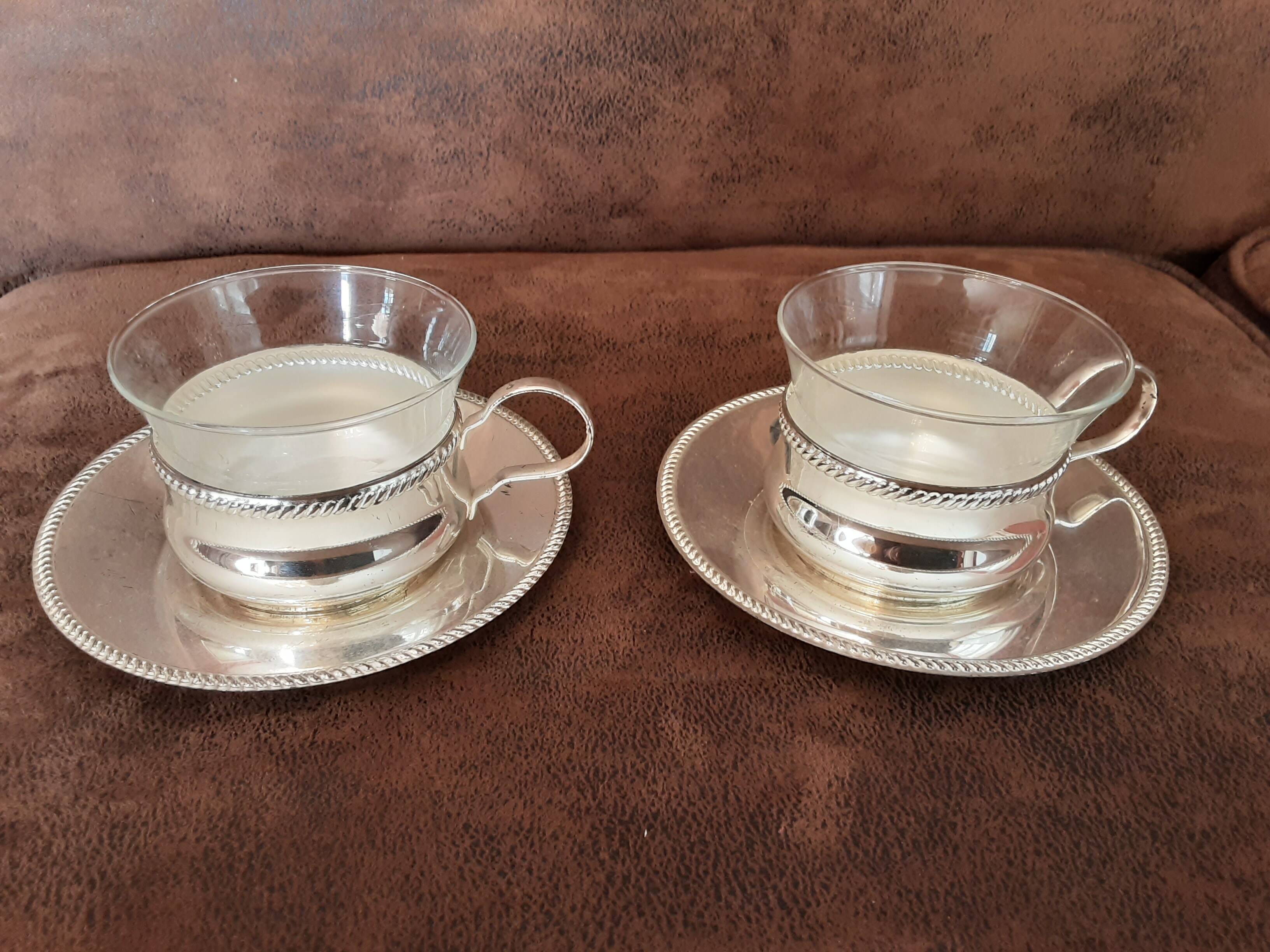 Set of 2 metal cups and saucers