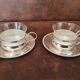Set of 2 metal cups and saucers