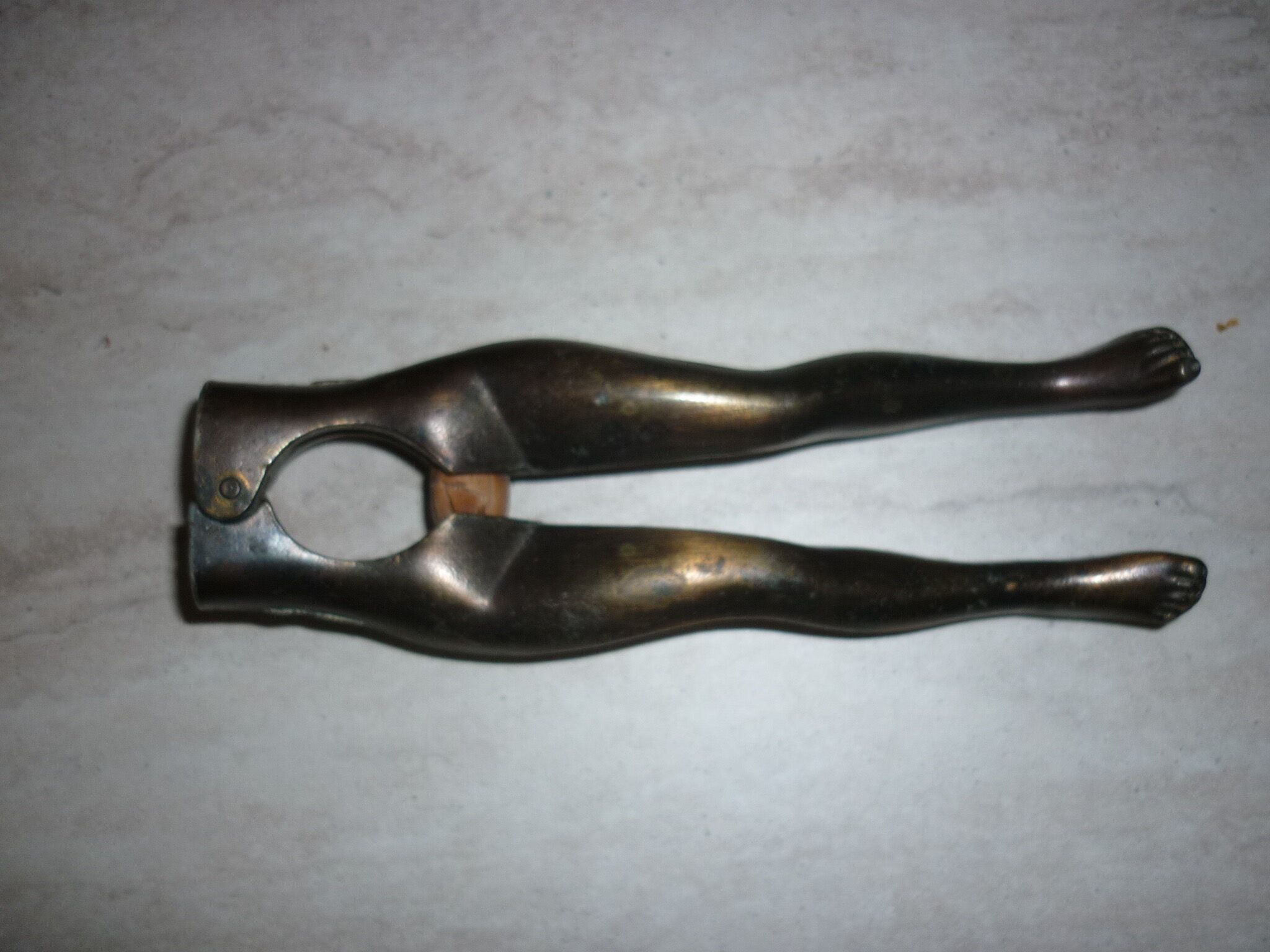 Nutcracker/hazelnut lower body female brass