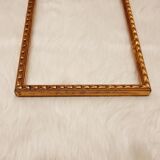 Golden wood frame with godrons