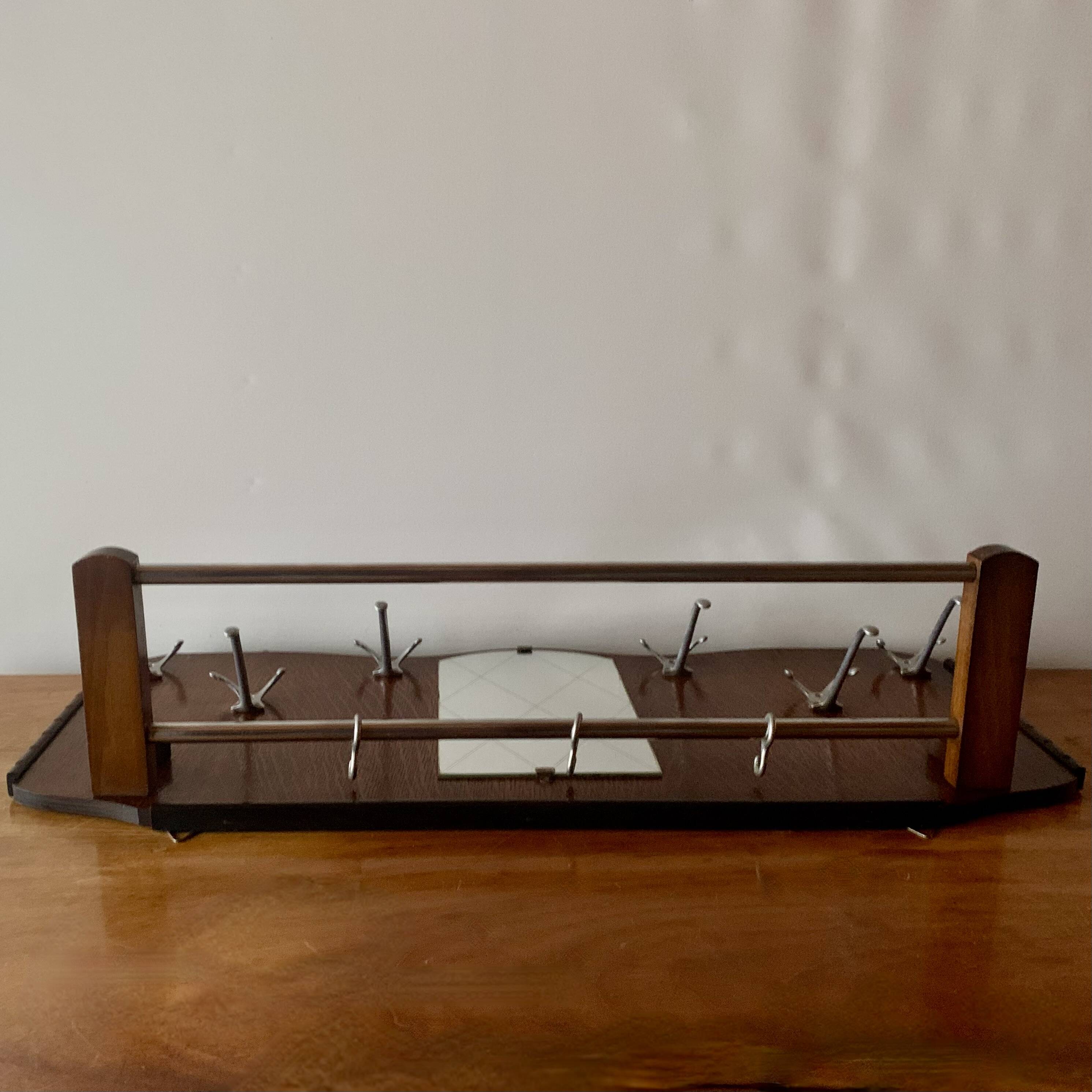 Ancien grand portemanteau en bois avec miroir et porte-chapeau