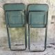 Pair of folding metal chairs, military or industrial, mid-20th century.