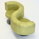 Yellow green space age bench with wavy design