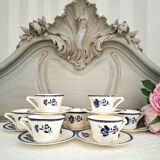 Antique cups with iron earthenware saucers